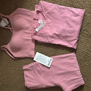 Lululemon pink crop leggings 98.00 on tag ribbed sports bra 68$ pink long sleeve